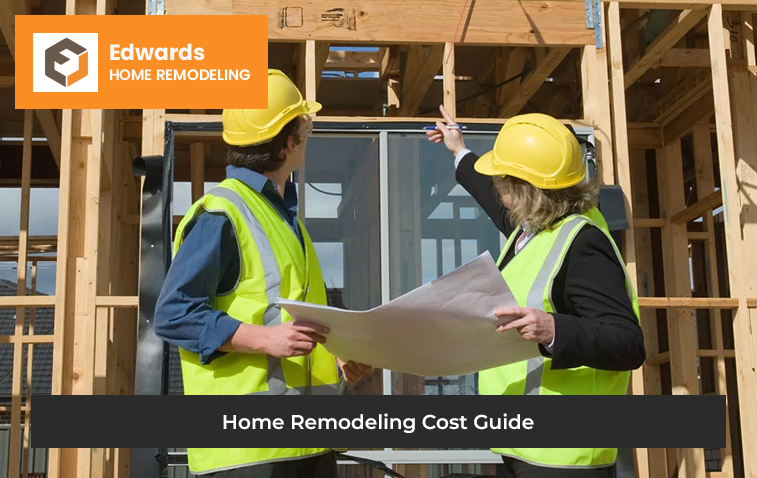 Two workers discussing home remodeling cost details in front of an under-construction house, holding documents.